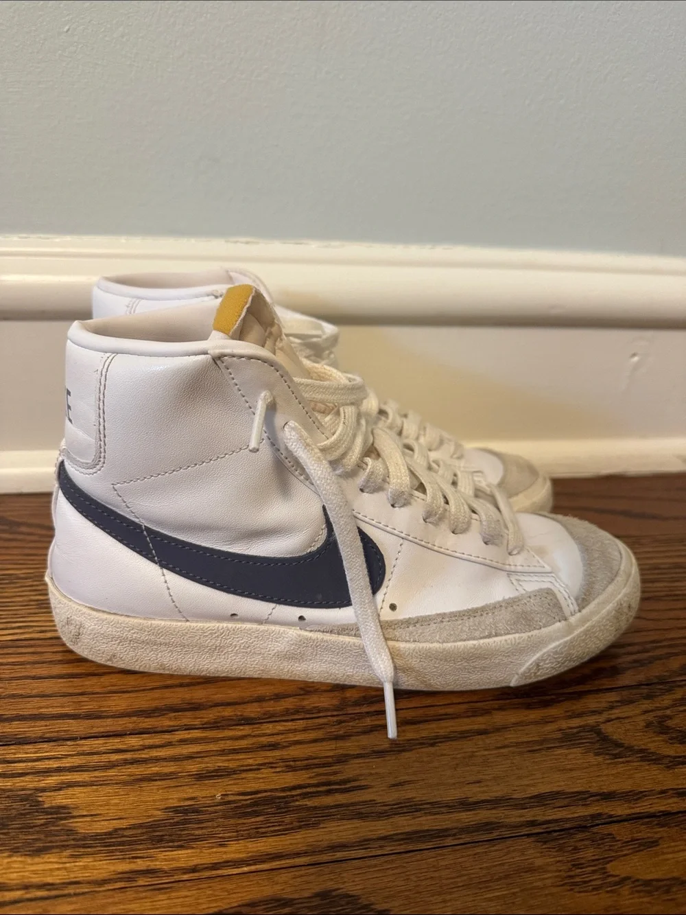 Women’s White High-Top Nike Sneakers